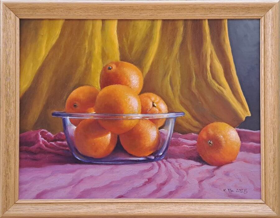 Apelsinai stikliniame dubenyje